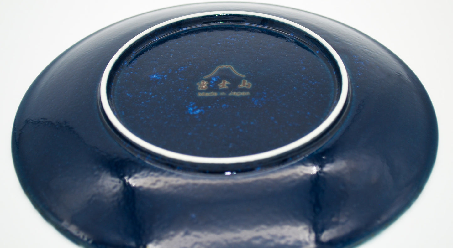 Navy blue ceramic plate with a logo on a white background