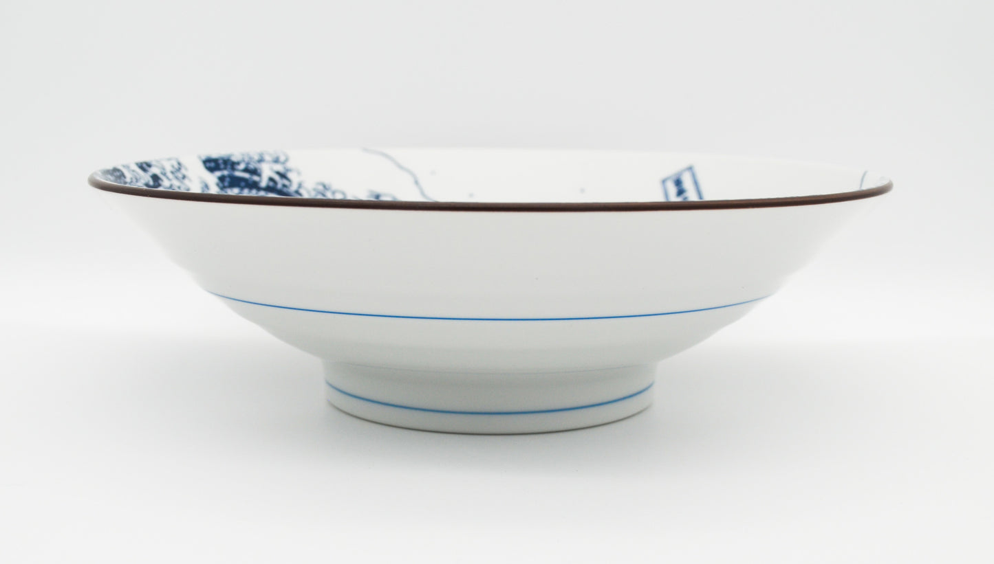 White bowl with blue patterns on a white background