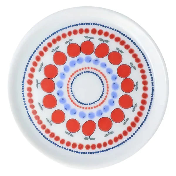 Decorative plate with red circular patterns and blue accents on a white background