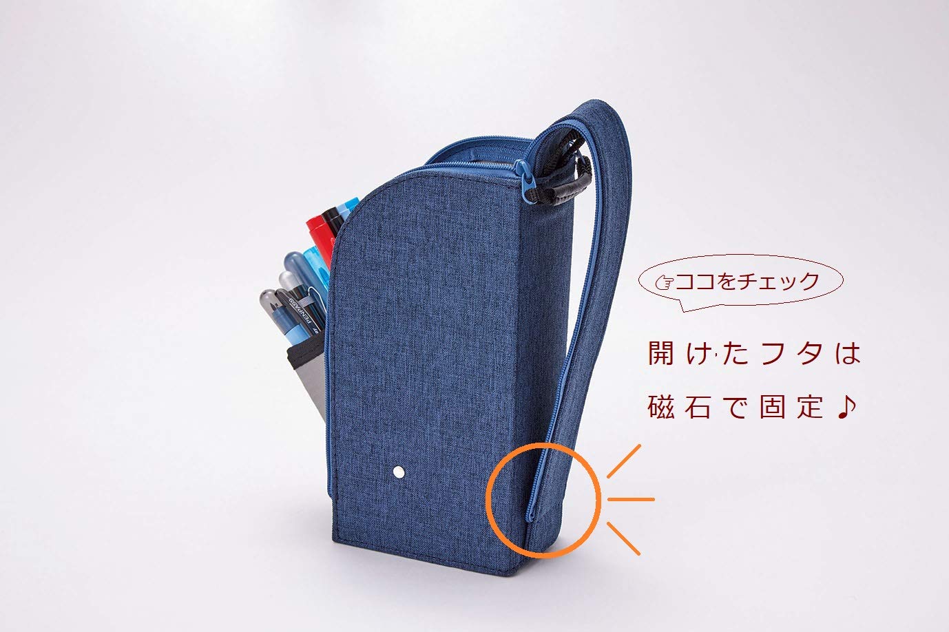 Blue fabric pouch with compartments on a white background