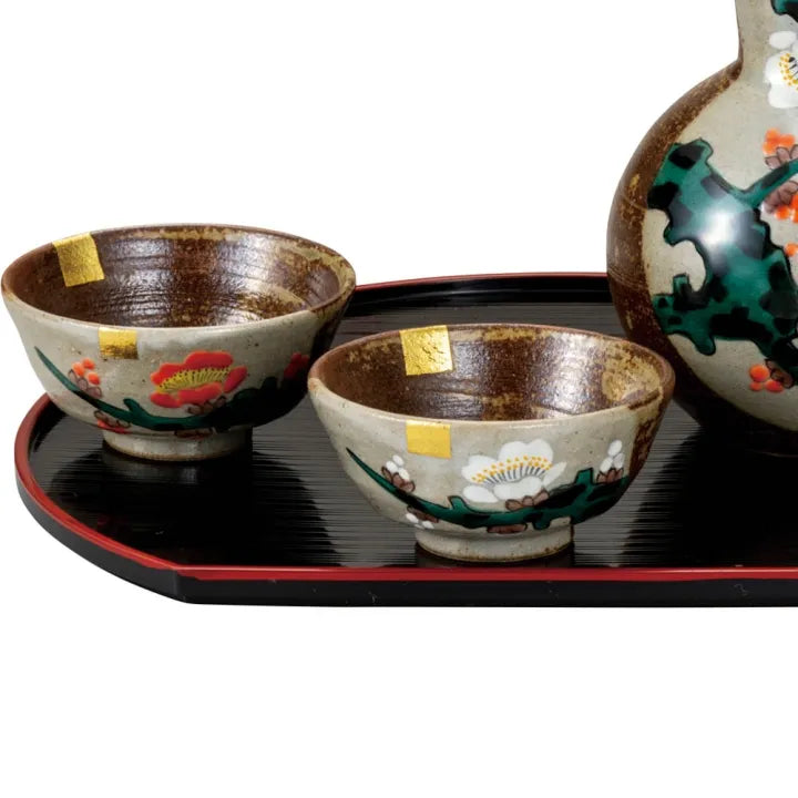 Ceramic Sake Set with two sake cups and a sake bottle on a black tray.