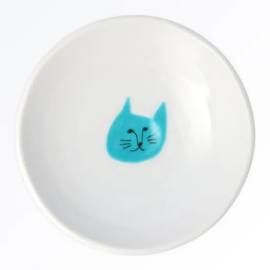 White ball with a blue cat face design on a white background