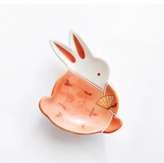 Ceramic bunny-shaped dish with a floral design on a white background. Japanese ceramics. Made in Japan.