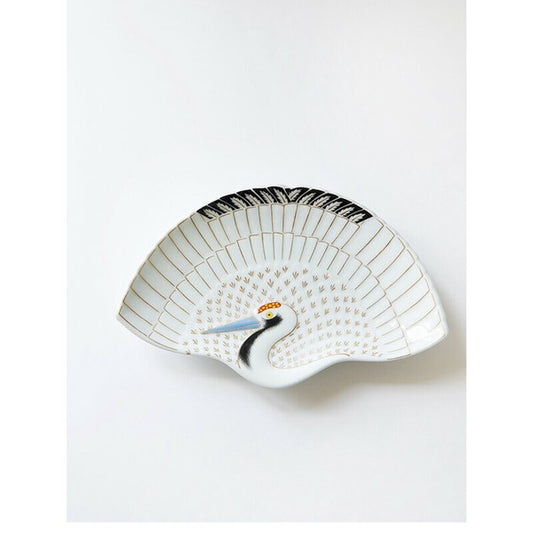 Decorative ceramic plate with a crane design on a white background