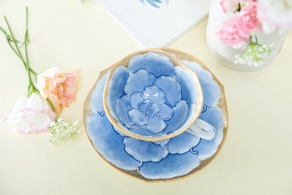 Decorative ceramic bowl with floral design on a light background