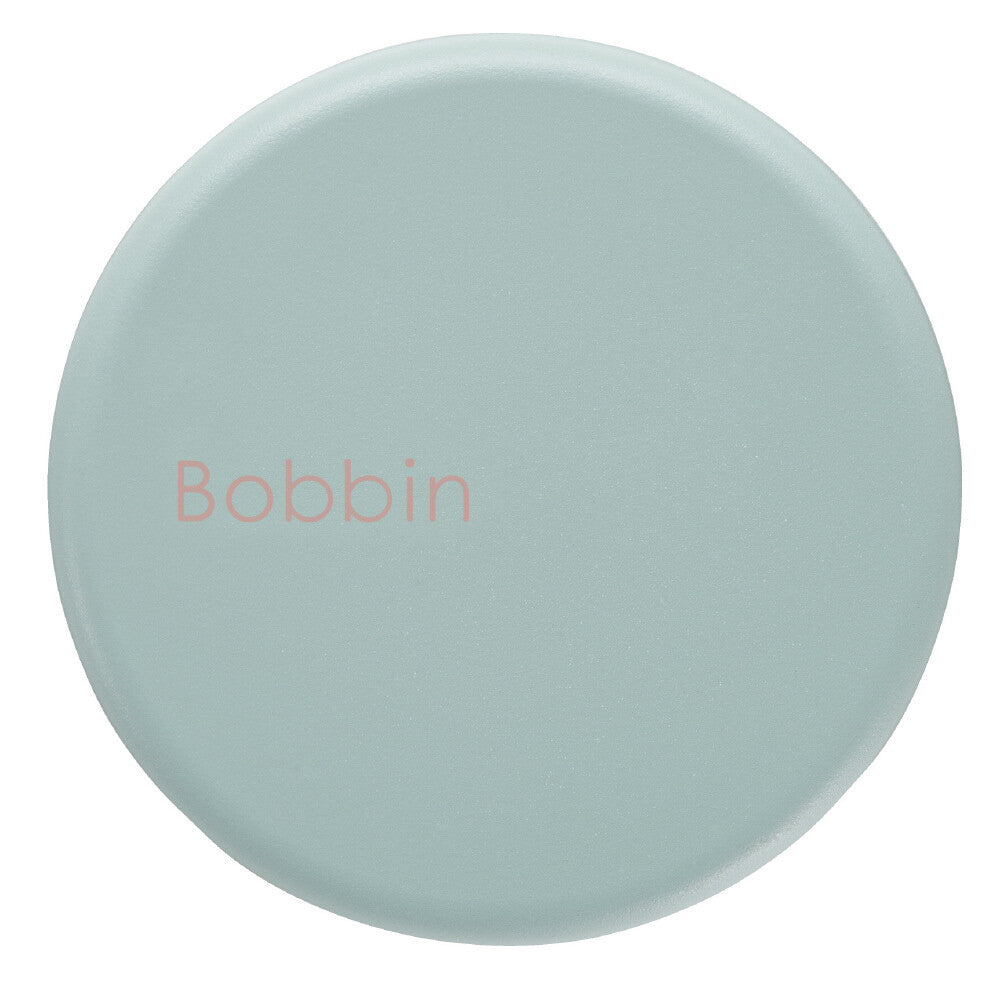 Round light blue object with 'Bobbin' text on a white background