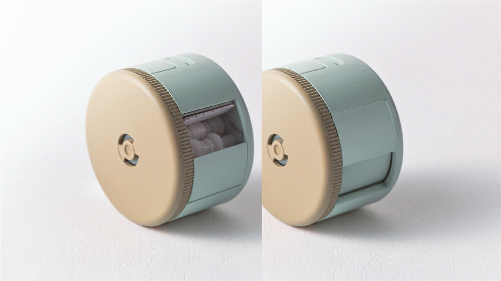 Two views of a cylindrical pencil sharpener with a beige top and green body on a white background.