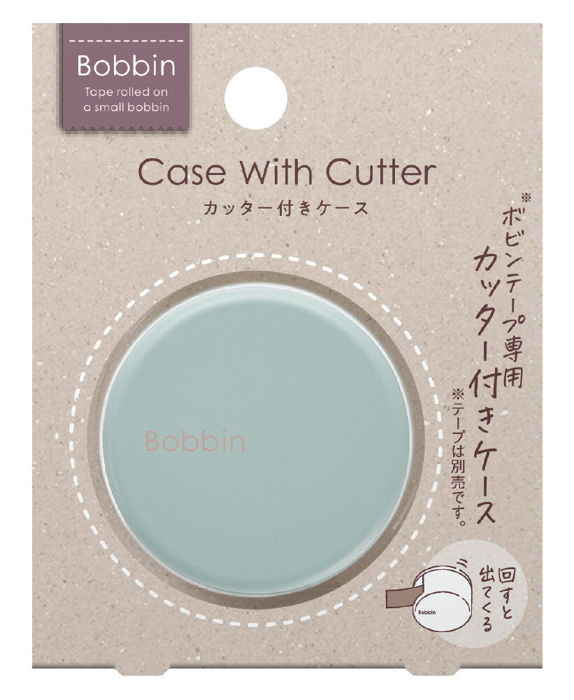 Bobbin case with cutter packaging on a beige background