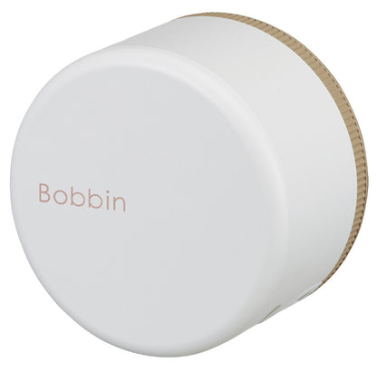 White bobbin with 'Bobbin' branding on a white background