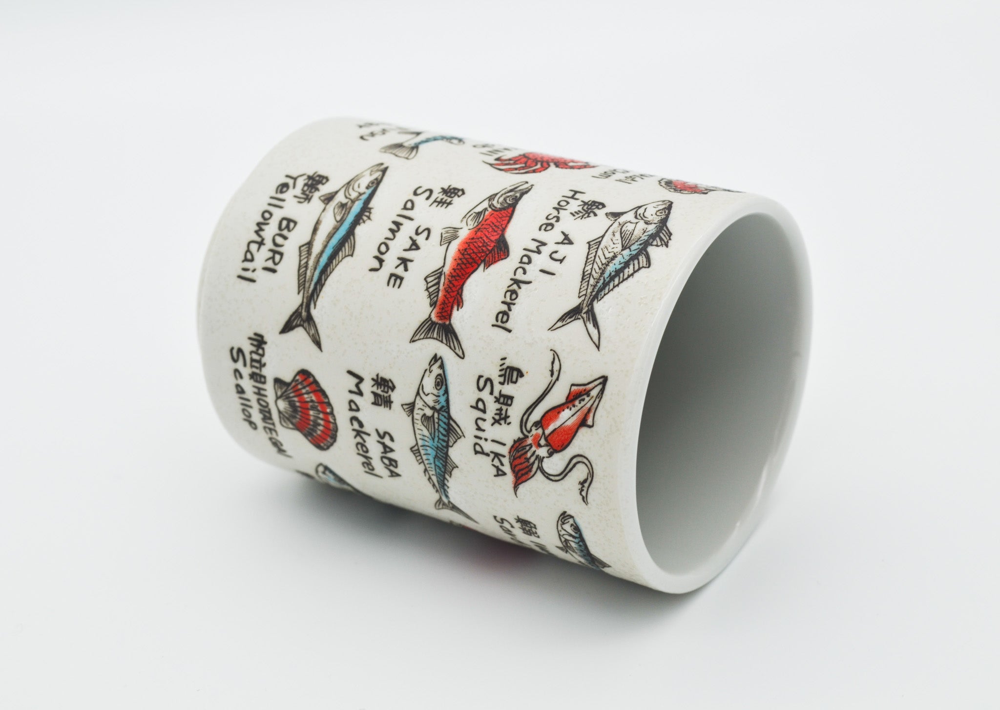 Cylindrical container with fish illustrations and text on a white background