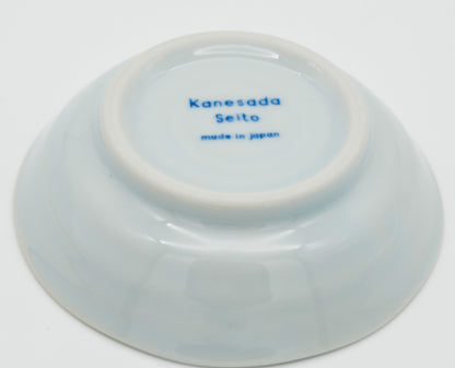 Ceramic bowl with 'Kanesada Seito made in Japan' text on a white background