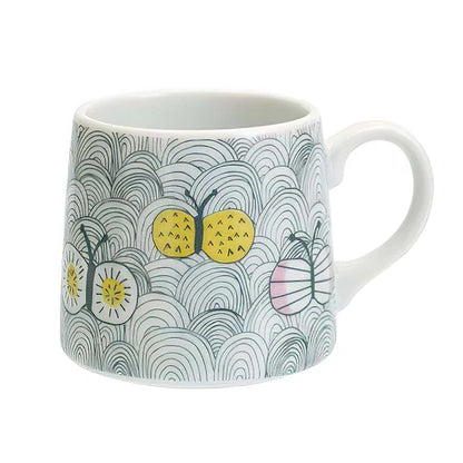 Mug with a butterfly and wave pattern on a white background