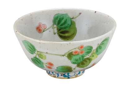 Ceramic bowl with floral design on a white background