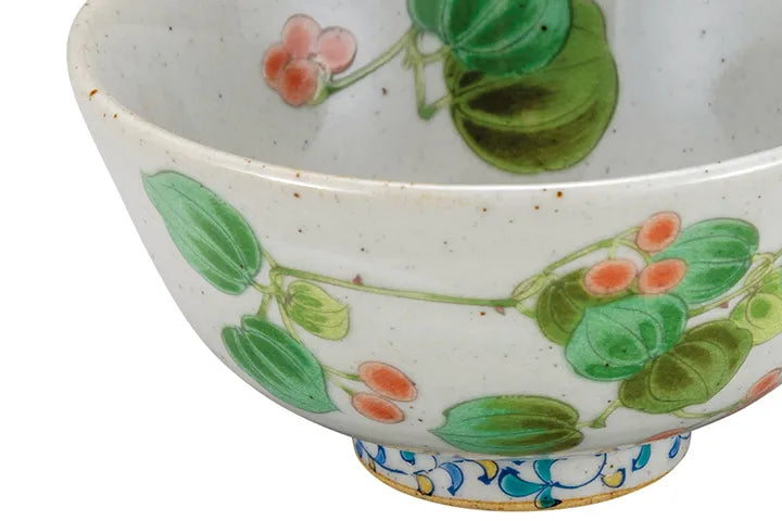 Ceramic bowl with floral design on a white background
