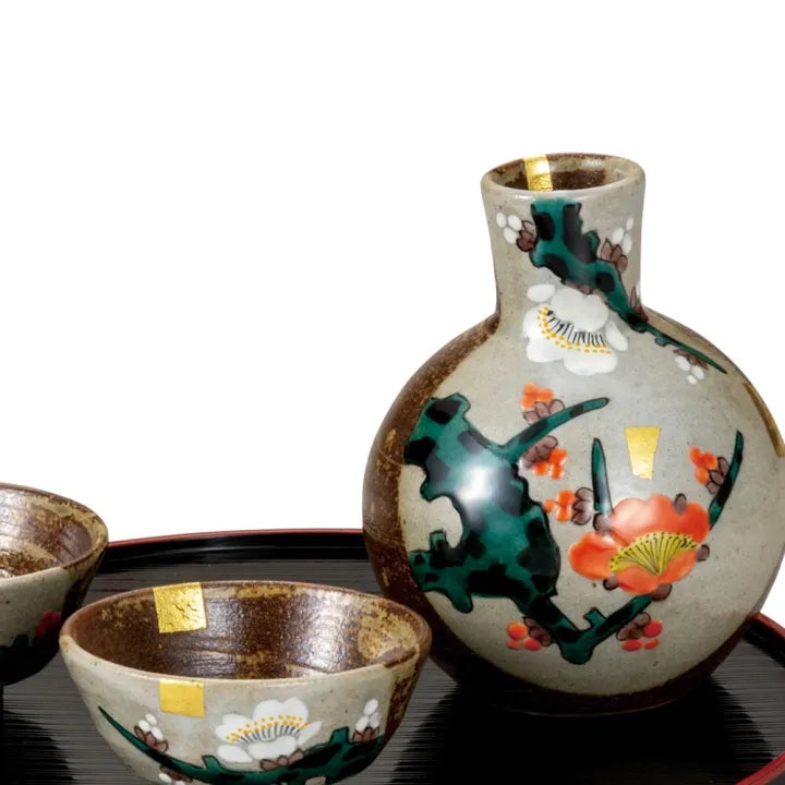 Ceramic Sake Set with two sake cups and a sake bottle on a black tray.