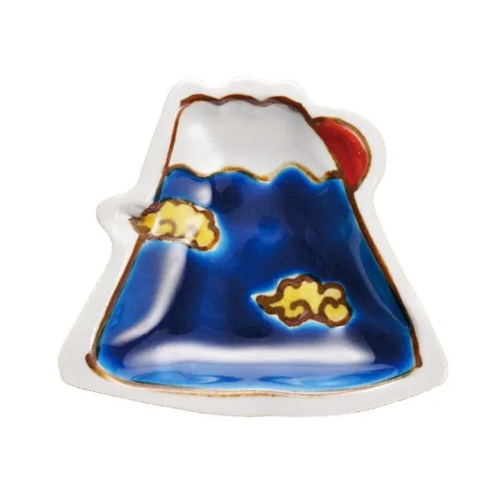 Decorative bell-shaped object with blue base and white top on a white background