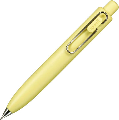 Yellow pen with a metallic clip on a white background