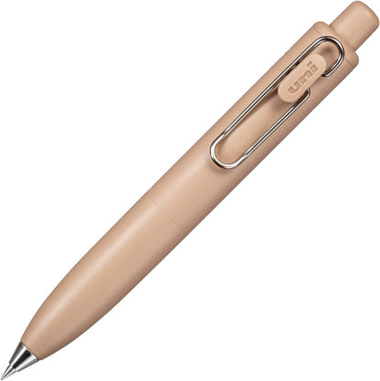 Beige pen with a metallic clip on a white background