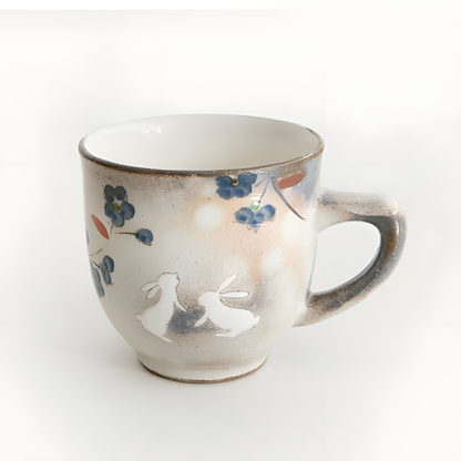 Ceramic mug with floral design on a white background. Japanese Ceramics. Made in Japan.